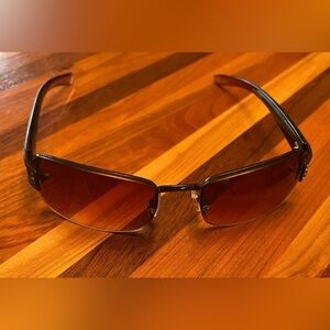 Stylish Relic Sunwear Sunglasses with brown lenses.